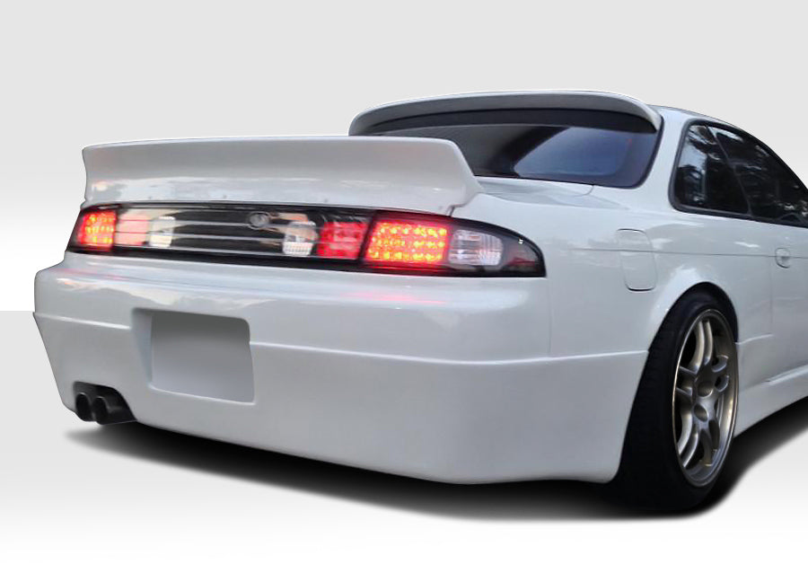 1995-1996 Nissan 240SX S14 Duraflex RBS V1 Kit - 9 Piece - Includes RBS V1 Front Bumper (113854) RBS V1 Side Skirts (113855) RBS V1 Rear Bumper (113856) RBS V1 Front Fenders (113857) RBS V1 Rear Fenders (113858) RBS Wing (112369)