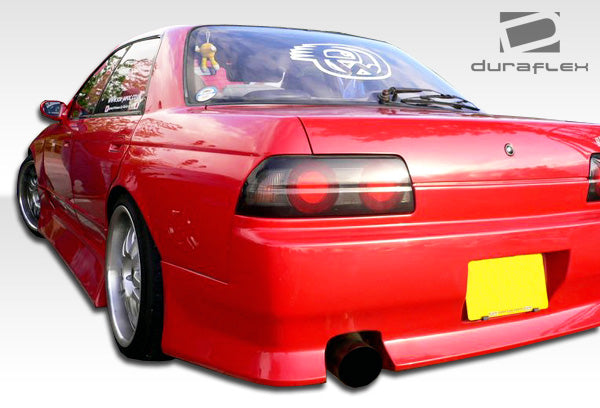 1989-1994 Nissan Skyline R32 4DR Duraflex B-Sport Body Kit - 4 Piece - Includes B-Sport Front Bumper Cover (104591) B-Sport Rear Bumper Cover (104593)and B-Sport Side Skirts Rocker Panels (104592)