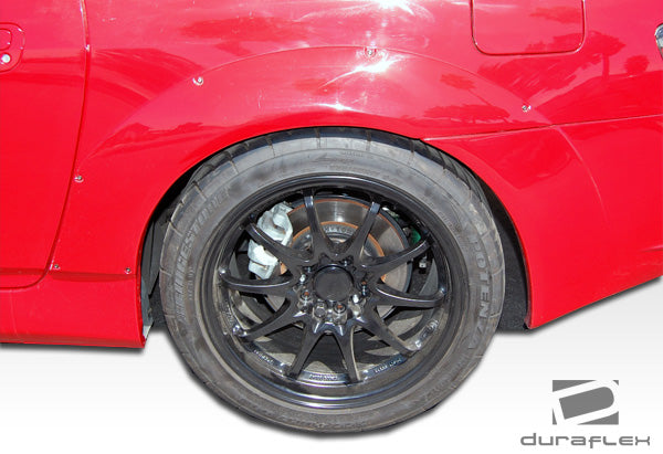 2000-2009 Honda S2000 Duraflex A-Sport Wide Body Kit - 14 Piece - Includes A-Sport Front Bumper Cover (105918) A-Sport Side Splitters (105919) A-Sport Rear Bumper Cover (105920) A-Sport Front Fenders (105921) A-Sport Rear Fender Flares (105922)