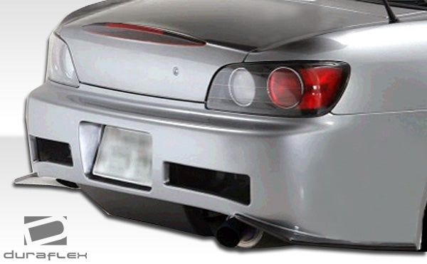 2000-2009 Honda S2000 Duraflex JS Body Kit - 7 Piece - Includes JS Front Fumper (105023) JS Front Splitter (105024) JS Side Skirts Rocker Panels (105025) JS Rear Bumper Cover (105026) JS Fenders (105027)