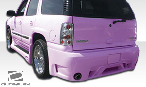 2000-2006 GMC Yukon Duraflex Platinum Body Kit - 4 Piece - Includes Platinum Front Bumper Cover (100057) Platinum Rear Bumper Cover (100017) Platinum Side Skirts Rocker Panels (100018)