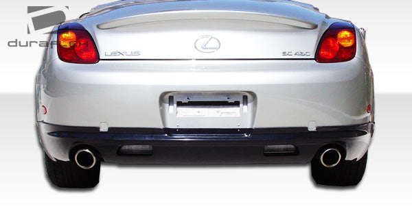 2002-2004 Lexus SC Series SC430 Duraflex W-1 Body Kit - 4 Piece - Includes W-1 Front Lip Under Spoiler Air Dam (103575) W-1 Side Skirts Rocker Panels (103576) W-1 Rear Lip Under Spoiler Air Dam (103577)