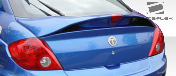 2003-2006 Hyundai Tiburon Duraflex SC-5 Body Kit - 6 Piece - Includes SC-5 Front Bumper Cover (100447) SC-5 Rear Bumper Cover (100448) SC-5 Side Skirts Rocker Panels (100450) SC-5 Rear Fender Flares (100449)