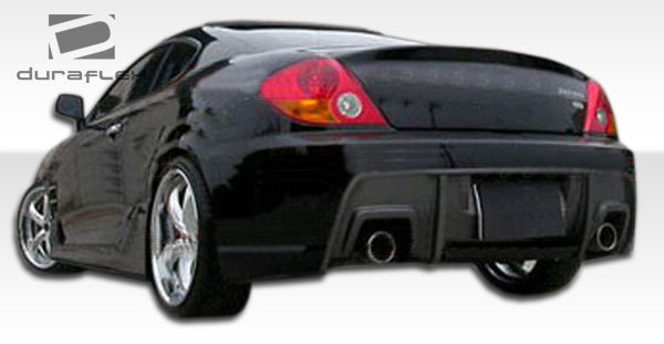 2003-2006 Hyundai Tiburon Duraflex Spec-R Body Kit - 4 Piece - Includes Spec-R Front Bumper Cover (106005) Spec-R Side Skirts Rocker Panels (106006) Spec-R Rear Bumper Cover (106007)