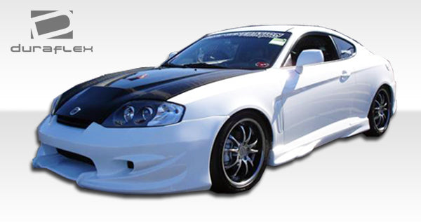 2003-2006 Hyundia Tiburon Duraflex Vader Body Kit - 4 Piece - Includes Vader Front Bumper Cover (100451) Vader Rear Bumper Cover (100452) Vader Side Skirts Rocker Panels (100453)