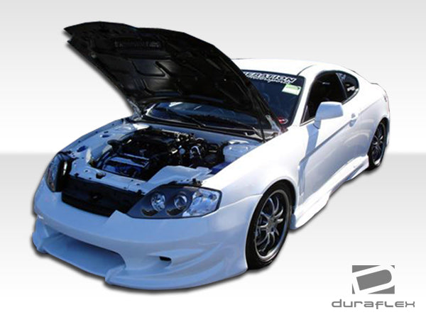 2003-2006 Hyundia Tiburon Duraflex Vader Body Kit - 4 Piece - Includes Vader Front Bumper Cover (100451) Vader Rear Bumper Cover (100452) Vader Side Skirts Rocker Panels (100453)