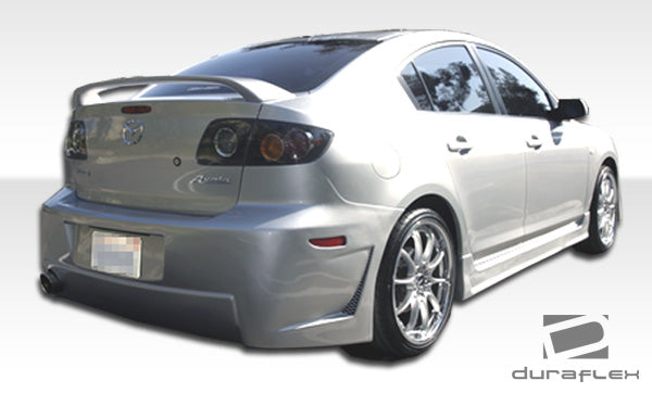 2004-2008 Mazda 3 4DR Duraflex B-2 Body Kit - 4 Piece - Includes B-2 Front Bumper Cover (100562) B-2 Rear Bumper Cover (100563) B-2 Side Skirts Rocker Panels (100564)