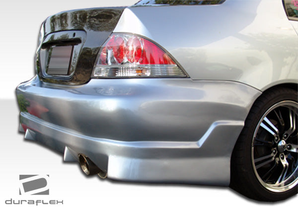 2004-2007 Mitsubishi Lancer Duraflex Walker Body Kit - 4 Piece - Includes Walker Front Bumper Cover (100575) Walker Rear Bumper Cover (100576) Walker Side Skirts Rocker Panels (100577)