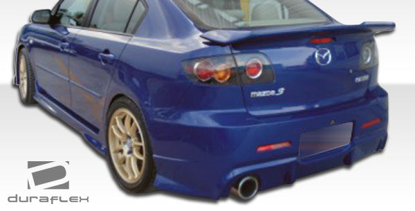 2004-2009 Mazda 3 4DR Duraflex I-Spec Body Kit - 6 Piece - Includes I-Spec Front Bumper Cover (104479) I-Spec Rear Bumper Cover (104480) I-Spec Side Skirts Rocker Panels (104481) I-Spec Grille (104482) I-Spec Rear Wing Trunk Lid Spoiler (104483)