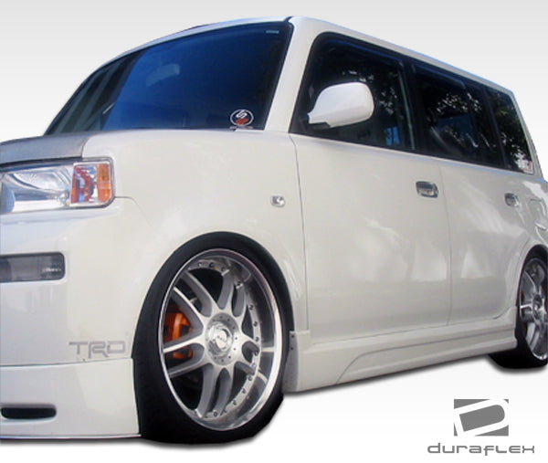 2004-2006 Scion xB Duraflex F-1 Body Kit - 4 Piece - Includes F-1 Front Lip Under Spoiler Air Dam (103102) F-1 Rear Lip Under Spoiler Air Dam (103104) F-1 Side Skirts Rocker Panels (103103)