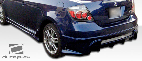 2005-2010 Scion tC Duraflex R34 Body Kit - 4 Piece - Includes R34 Front Bumper Cover (103457) Raven Side Skirts Rocker Panels (100672) Raven Rear Bumper Cover (100673)