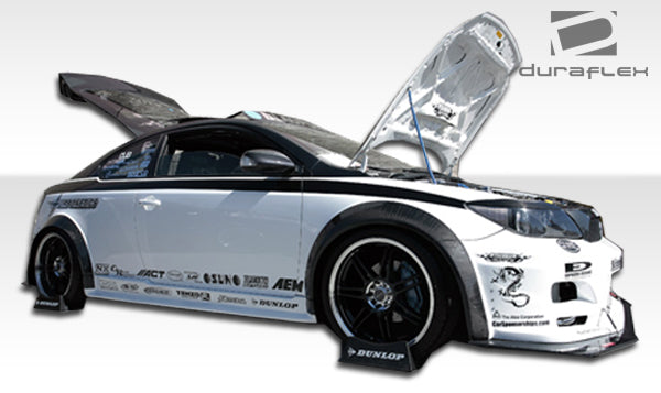 2005-2010 Scion tC Duraflex Touring Wide Body Kit - 8 Piece - Includes Touring Wide Body Front Bumper Cover (103041) Touring Wide Body Rear Bumper Cover (103043) Touring Wide Body Side Skirts Rocker Panels (103042) Touring Wide Body Fender Flares (103044)
