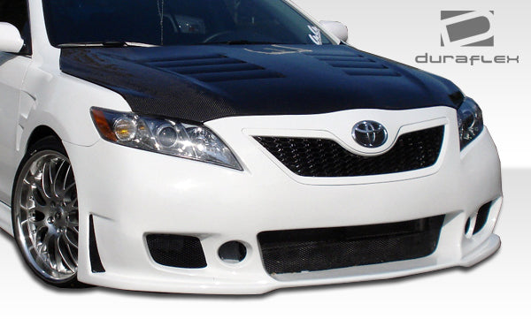 2007-2009 Toyota Camry Duraflex B-2 Body Kit - 4 Piece - Includes B-2 Front Bumper Cover (104350) B-2 Rear Bumper Cover (104352) B-2 Side Skirts Rocker Panels (104351)