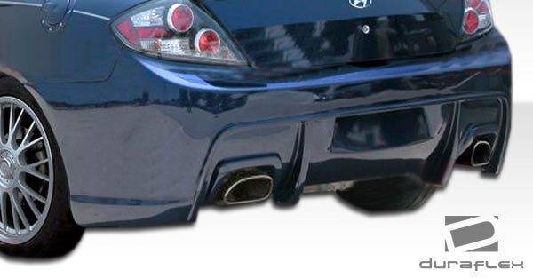 2007-2008 Hyundai Tiburon Duraflex Spec-R Body Kit - 4 Piece - Includes Spec-R Front Bumper Cover (106001) Spec-R Side Skirts Rocker Panels (106002) Spec-R Rear Bumper Cover (106003)