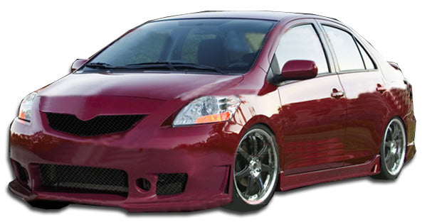 2007-2011 Toyota Yaris 4DR Duraflex B-2 Body Kit - 4 Piece - Includes B-2 Front Bumper Cover (103392) B-2 Side Skirts Rocker Panels (103393) B-2 Rear Bumper Cover (103394)