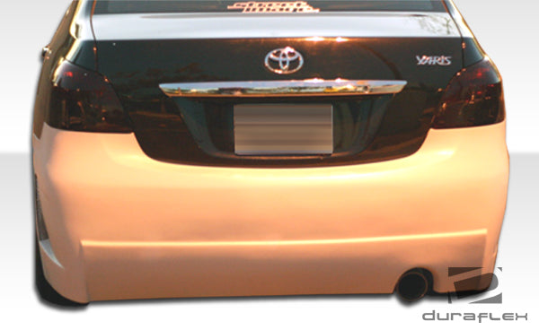 2007-2011 Toyota Yaris 4DR Duraflex B-2 Body Kit - 4 Piece - Includes B-2 Front Bumper Cover (103392) B-2 Side Skirts Rocker Panels (103393) B-2 Rear Bumper Cover (103394)