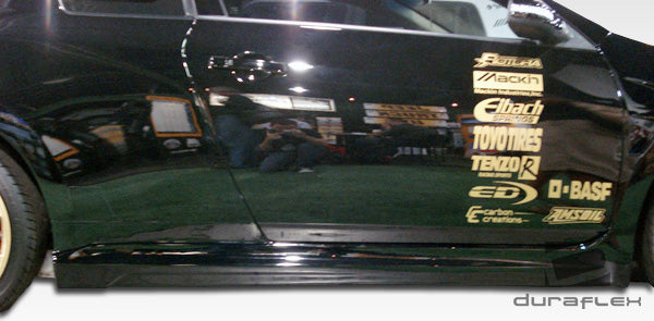 2010-2012 Nissan Altima 2DR Duraflex GT Concept Body Kit - 4 Piece - Includes GT Concept Front Bumper Cover ( 107403) GT Concept Side Skirts Rocker Panels (104307) GT Concept Rear Bumper Cover (104308)