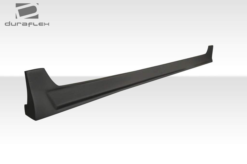 2007-2011 Toyota Yaris 4DR Duraflex B-2 Body Kit - 4 Piece - Includes B-2 Front Bumper Cover (103392) B-2 Side Skirts Rocker Panels (103393) B-2 Rear Bumper Cover (103394)