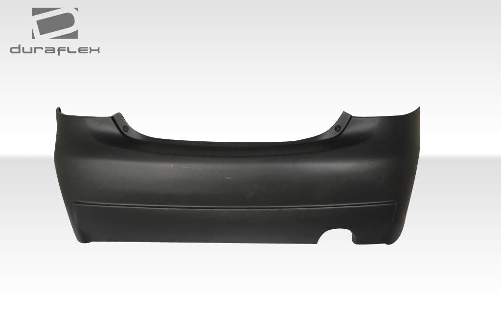 2007-2011 Toyota Yaris 4DR Duraflex B-2 Body Kit - 4 Piece - Includes B-2 Front Bumper Cover (103392) B-2 Side Skirts Rocker Panels (103393) B-2 Rear Bumper Cover (103394)