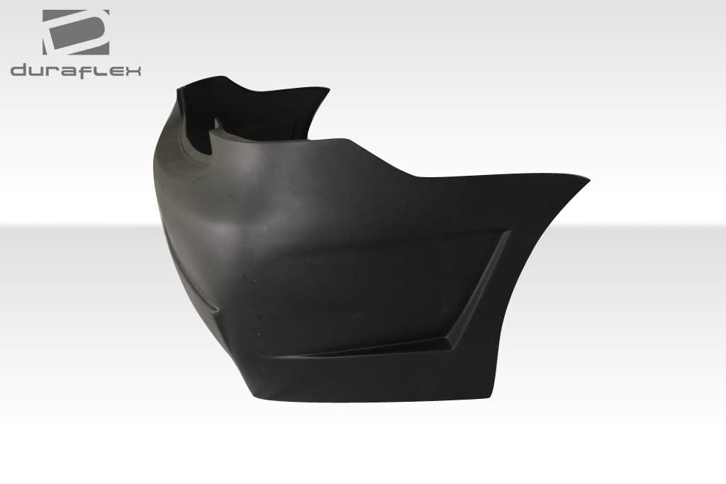 2007-2011 Toyota Yaris 4DR Duraflex B-2 Body Kit - 4 Piece - Includes B-2 Front Bumper Cover (103392) B-2 Side Skirts Rocker Panels (103393) B-2 Rear Bumper Cover (103394)