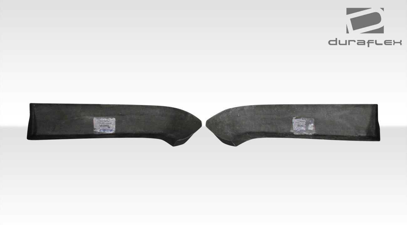 2002-2004 Toyota Camry Duraflex Vortex Body Kit - 6 Piece - Includes Vortex Front Lip Under Spoiler Air Dam (104216) Vortex Rear Add On Bumper Spat Extensions (104218) Vortex Side Skirts Rocker Panels (104217) Vortex Front Grille (104215)