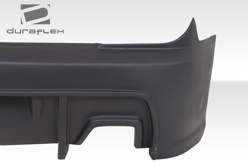 2003-2006 Hyundai Tiburon Duraflex Spec-R Body Kit - 4 Piece - Includes Spec-R Front Bumper Cover (106005) Spec-R Side Skirts Rocker Panels (106006) Spec-R Rear Bumper Cover (106007)