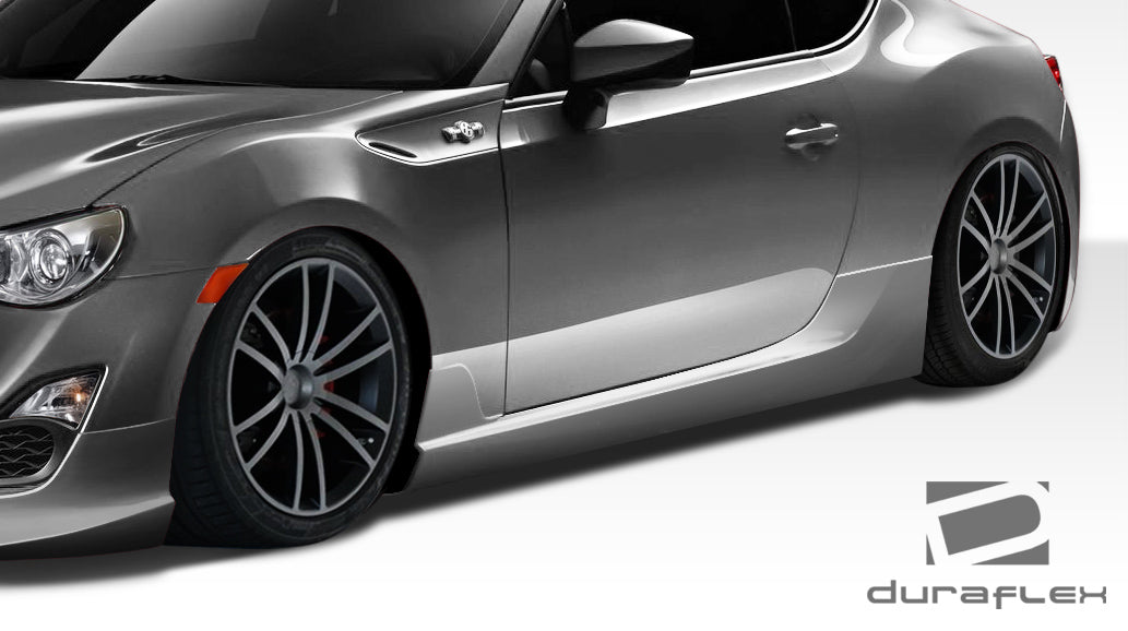 2013-2016 Scion FR-S Duraflex X-5 Body Kit - 6 Piece - Includes X-5 Front Lip Under Spoiler Air Dam (108487) X-5 Side Skirts Rocker Panels (108490) X-5 Rear Add On Bumper Spat Extensions (108488) X-5 Rear Wing Trunk Lid Spoiler (108489)