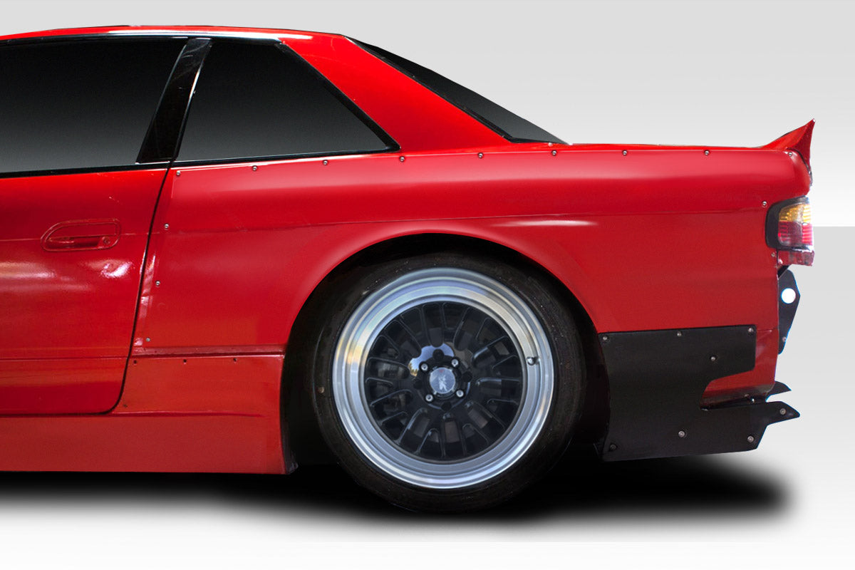 1989-1994 Nissan Silvia S13 2dr Duraflex RBS Wide Body Kit - 9 Piece - Includes RBS V1 Front Bumper (113864) RBS V1 Side Skirts (113865) RBS V1 Rear Bumper (113866) RBS V1 Front Fenders (113867) RBS V1 Rear Fenders (113868) RBS Wing Spoiler (112058)