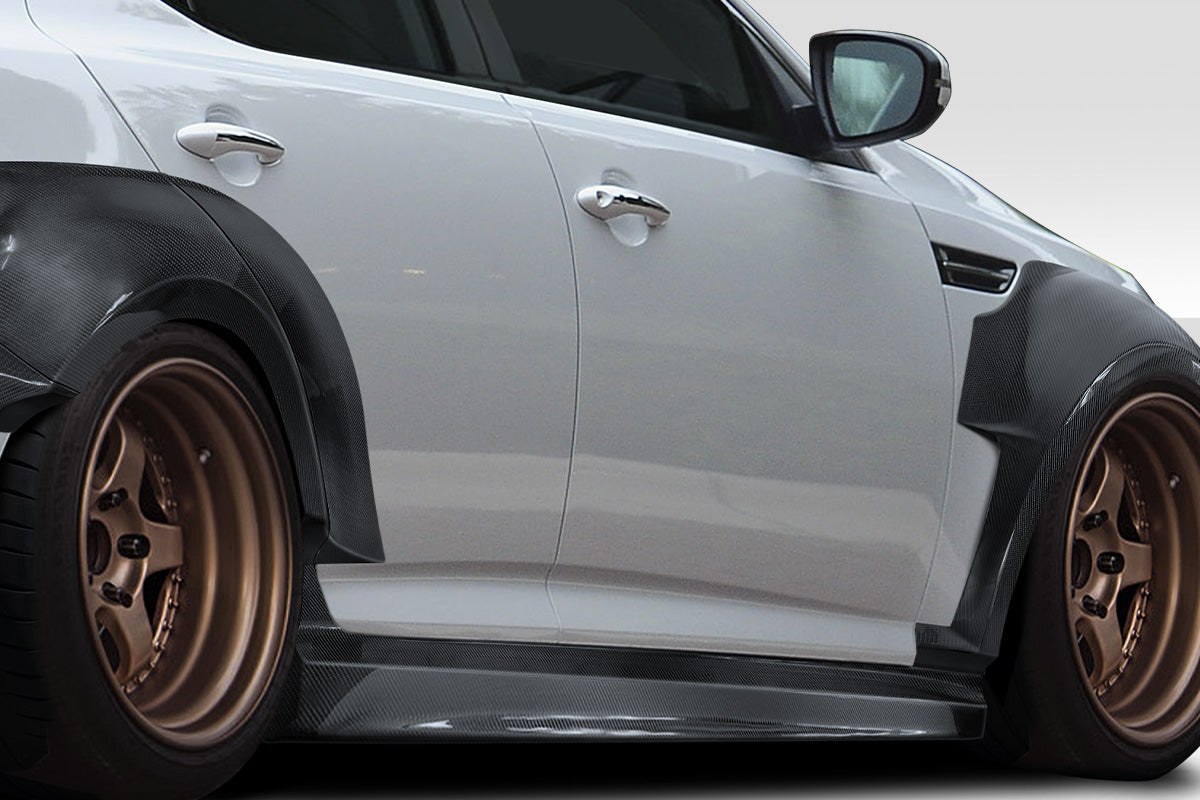 2011-2013 Kia Optima Carbon Creations CPR Body Kit - 14 Piece - Includes 116098 CPR Front Lip, 116247 CPR Side Skirts,, 116248 CPR Front Fender Flares, 116249 CPR Rear Fender Flares. 116246 CPR Rear Wing Spoiler