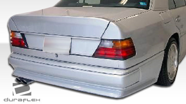 1986-1995 Mercedes E Class W124 Duraflex AMG Style Body Kit - 4 Piece - Includes AMG Style Front Bumper Cover (105060) AMG Style Rear Bumper Cover (105063) AMG Style Side Skirts Rocker Panels (105061)