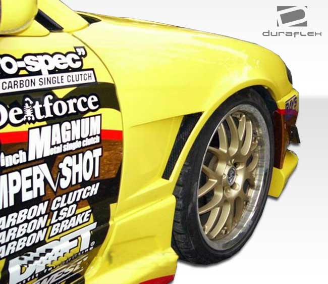 1989-1994 Nissan 240SX S13 Duraflex Silvia S13 Conversion V-Speed Kit - 4 Piece - Includes S13 Conversion V-Speed Front Bumper Cover (102204) S13 Conversion M-1 Sport Fenders (100877) S13 Conversion M-1 Sport Hood (102203)