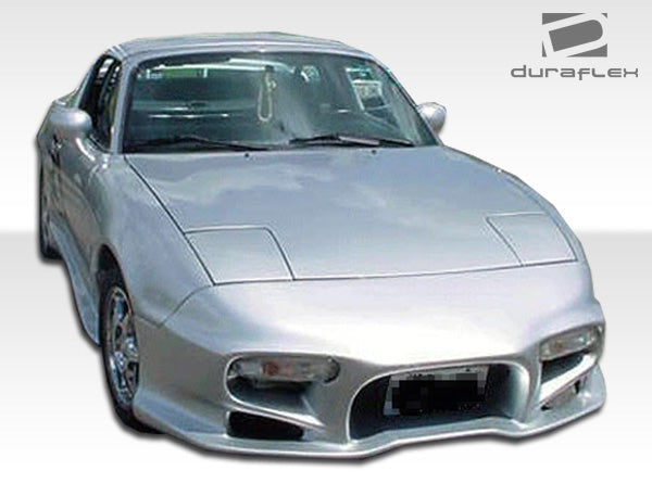 1990-1997 Mazda Miata Duraflex Vader Body Kit - 4 Piece - Includes Vader Front Bumper Cover (100961) Vader Rear Lip Under Spoiler Air Dam (100962) Vader Side Skirts Rocker Panels (100963)