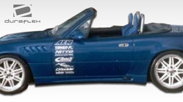 1990-1997 Mazda Miata Duraflex Wizdom Body Kit - 4 Piece - Includes Wizdom Front Bumper Cover (100964) Wizdom Rear Bumper Cover (100965) Wizdom Side Skirts Rocker Panels (100966)