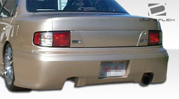 1992-1996 Toyota Camry 4DR Duraflex Swift Body Kit - 4 Piece - Includes Swift Front Bumper Cover (101207) Swift Rear Bumper Cover (101208) Swift Side Skirts Rocker Panels (101209)