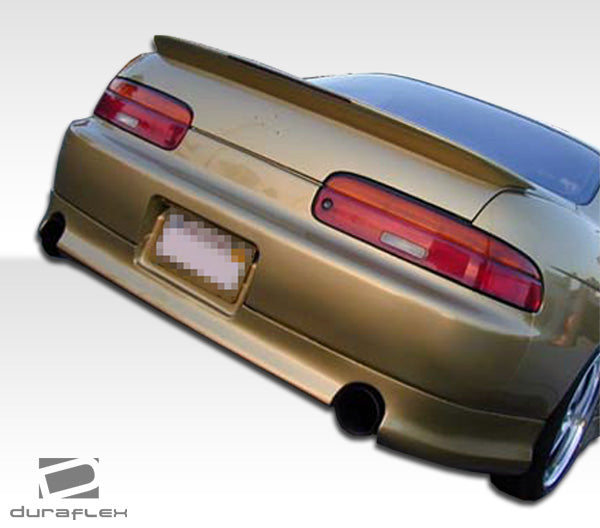 1992-2000 Lexus SC Series SC300 SC400 Duraflex J-Magic Body Kit - 4 Piece - Includes J-Magic Front Bumper Cover (101180) J-Magic Rear Lip Under Spoiler Air Dam (101181) J-Magic Side Skirts Rocker Panels (101182)