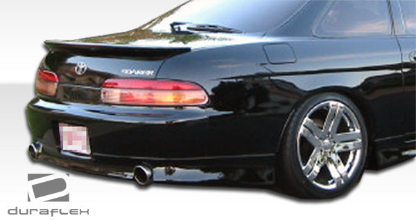 1992-2000 Lexus SC Series SC300 SC400 Duraflex V-Speed Body Kit - 4 Piece - Includes V-Speed Front Bumper Cover (101183) V-Speed Rear Lip Under Spoiler Air Dam (101184) V-Speed Side Skirts Rocker Panels (101185)