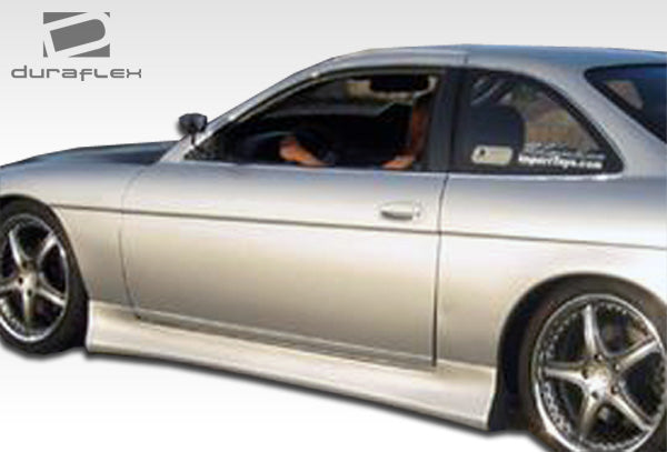 1992-2000 Lexus SC Series SC300 SC400 Duraflex V-Speed Body Kit - 4 Piece - Includes V-Speed Front Bumper Cover (101183) V-Speed Rear Lip Under Spoiler Air Dam (101184) V-Speed Side Skirts Rocker Panels (101185)