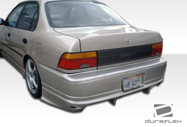 1993-1997 Toyota Corolla Geo Prizm Duraflex Bomber Body Kit - 4 Piece - Includes Bomber Front Bumper Cover (101324) Bomber Rear Bumper Cover (101325) Bomber Side Skirts Rocker Panels (102033)