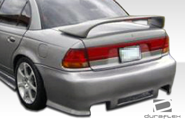 1996-1999 Saturn SL Duraflex R34 Body Kit - 4 Piece - Includes R34 Front Bumper Cover (101797) Spyder Rear Bumper Cover (101795) M3 Side Skirts Rocker Panels (101796)