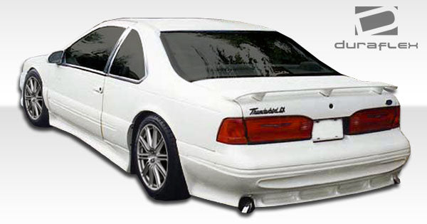 1996-1997 Ford Thunderbird Mercury Cougar Duraflex Racer Body Kit - 4 Piece - Includes Racer Front Lip Under Spoiler Air Dam (104375) Racer Rear Lip Under Spoiler Air Dam (104377) Racer Side Skirts Rocker Panels (104376)