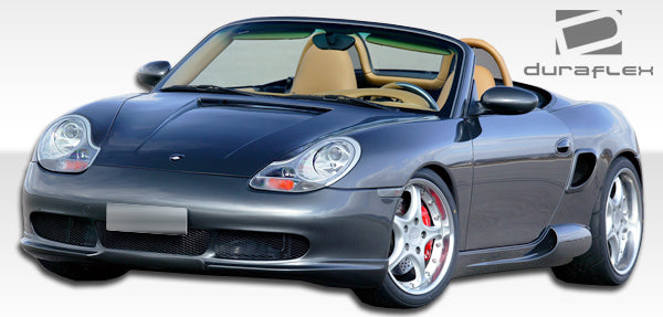 1997-2004 Porsche Boxster Duraflex G-Sport Body Kit - 4 Piece - Includes G-Sport Front Lip Under Spoiler Air Dam (105137) G-Sport Rear Lip Under Spoiler Air Dam (105139) G-Sport Side Skirts Rocker Panels (105138)