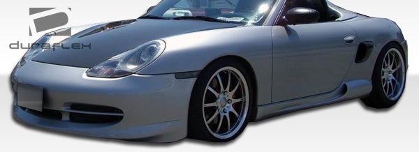 1997-2004 Porsche Boxster Duraflex G-Sport Body Kit - 4 Piece - Includes G-Sport Front Lip Under Spoiler Air Dam (105137) G-Sport Rear Lip Under Spoiler Air Dam (105139) G-Sport Side Skirts Rocker Panels (105138)
