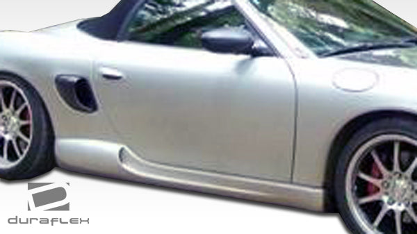 1997-2004 Porsche Boxster Duraflex G-Sport Body Kit - 4 Piece - Includes G-Sport Front Lip Under Spoiler Air Dam (105137) G-Sport Rear Lip Under Spoiler Air Dam (105139) G-Sport Side Skirts Rocker Panels (105138)