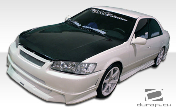 1997-2001 Toyota Camry Duraflex R34 Body Kit - 4 Piece - Includes R34 Front Bumper Cover (101929) Xtreme Rear Bumper Cover (101925) Xtreme Side Skirts Rocker Panels (101926)