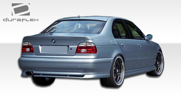 1997-2003 BMW 5 Series E39 Duraflex M5 Look Body Kit - 4 Piece - Includes M5 Front Bumper Cover (101801) AC-S Side Skirts Rocker Panels (103482) M5 Rear Bumper Cover (101802)