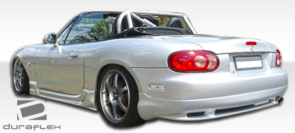2001-2005 Mazda Miata Duraflex Wizdom Body Kit - 4 Piece - Includes Wizdom Front Bumper Cover (105960) Wizdom Side Skirts Rocker Panels (105961) Wizdom Rear Lip Under Spoiler Air Dam (105962)