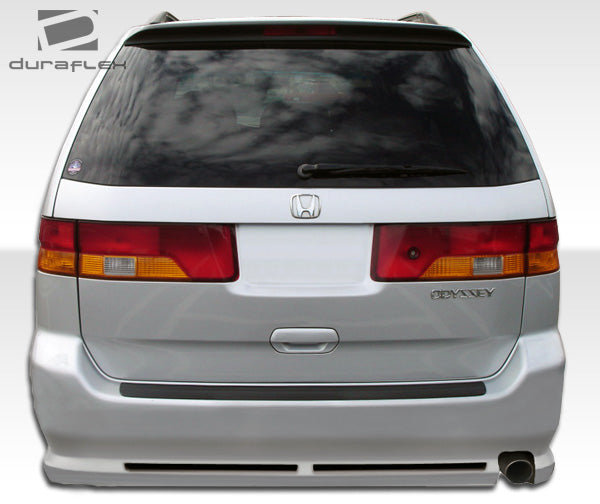 1999-2004 Honda Odyssey Duraflex R34 Body Kit - 4 Piece - Includes R34 Front Bumper Cover (102111) R34 Rear Bumper Cover (102112) R34 Side Skirts Rocker Panels (102113)