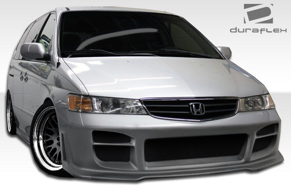 1999-2004 Honda Odyssey Duraflex R34 Body Kit - 4 Piece - Includes R34 Front Bumper Cover (102111) R34 Rear Bumper Cover (102112) R34 Side Skirts Rocker Panels (102113)